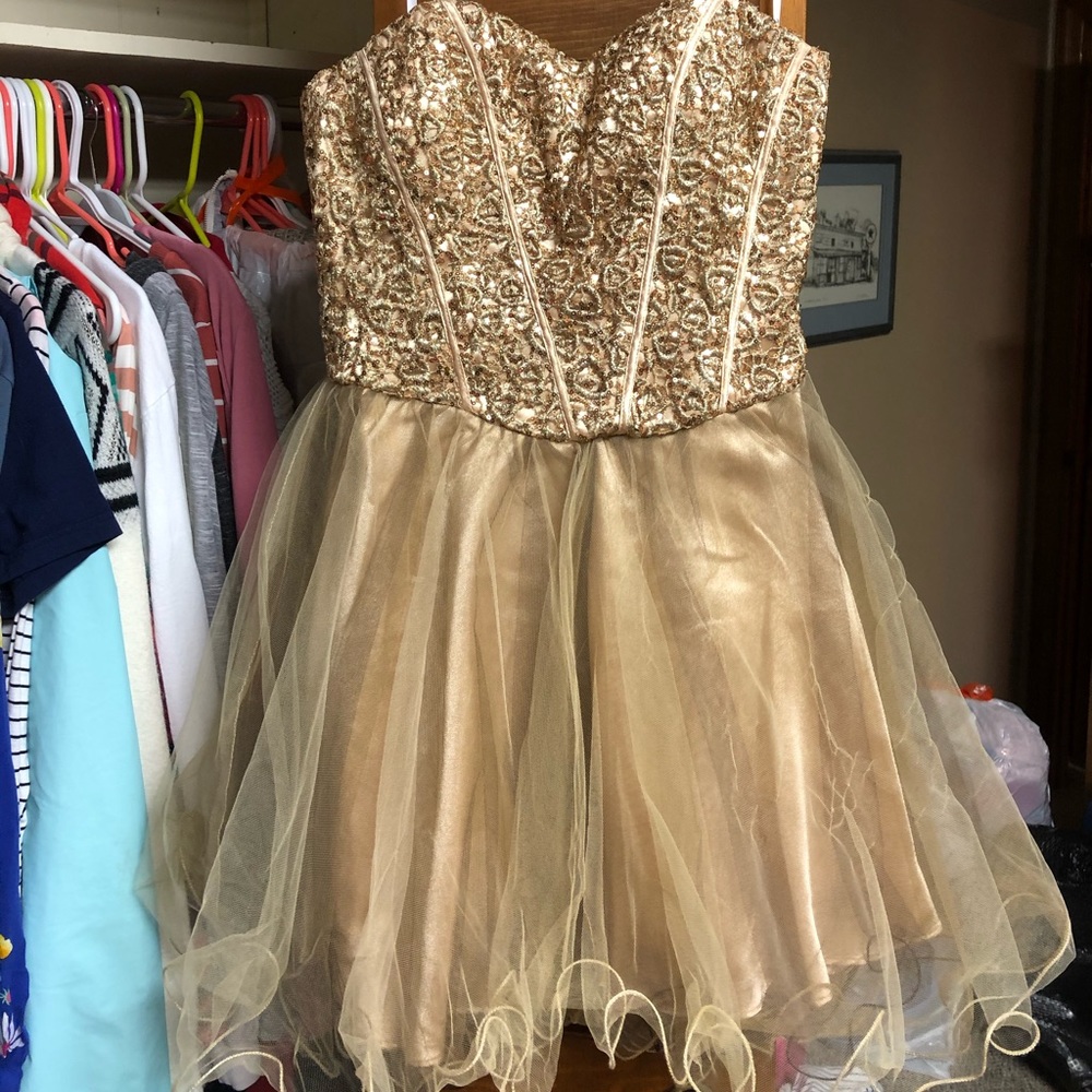 Short, sleeveless formal dress
